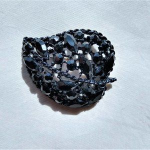 Weiss vintage black rhinestone pin or brooch, leaf design, signed